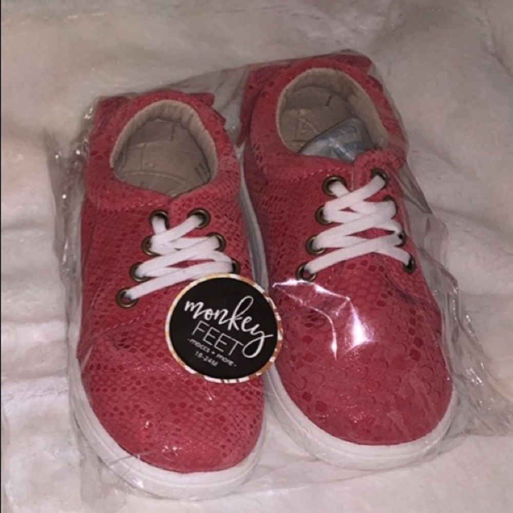 Brand new pink snake low tops with bow